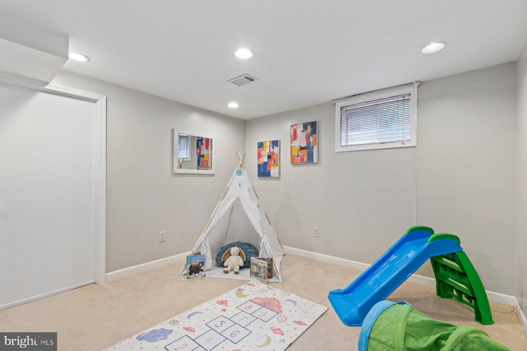 2605 Eccleston Street Silver Spring, MD 20902 - Photo 37 of 47 a bedroom with a bed and a wooden floor