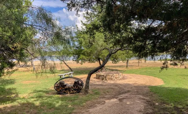 a outdoor space with furniture and umbrella