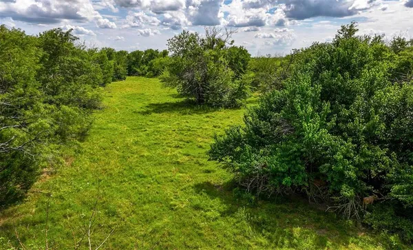 a view of a lake view with a big yard