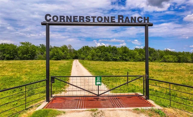 a view of a street with a ocean view