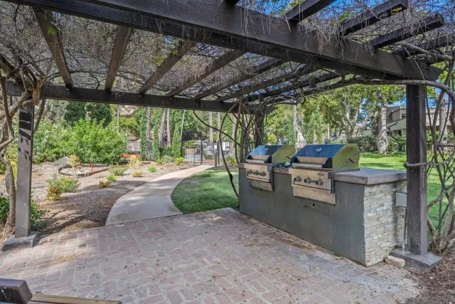 a view of yard with wooden fence
