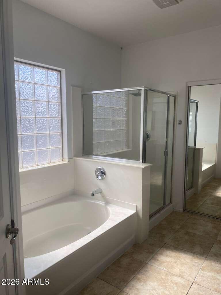 9677 Barley Road Florence, AZ 85132 - Photo 6 of 22 a bathroom with a bathtub and a sink
