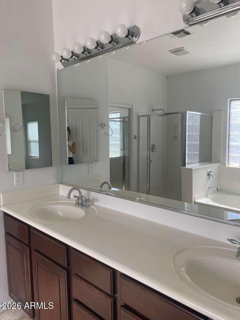 9677 Barley Road Florence, AZ 85132 - Photo 8 of 22 a bathroom with a sink and a mirror