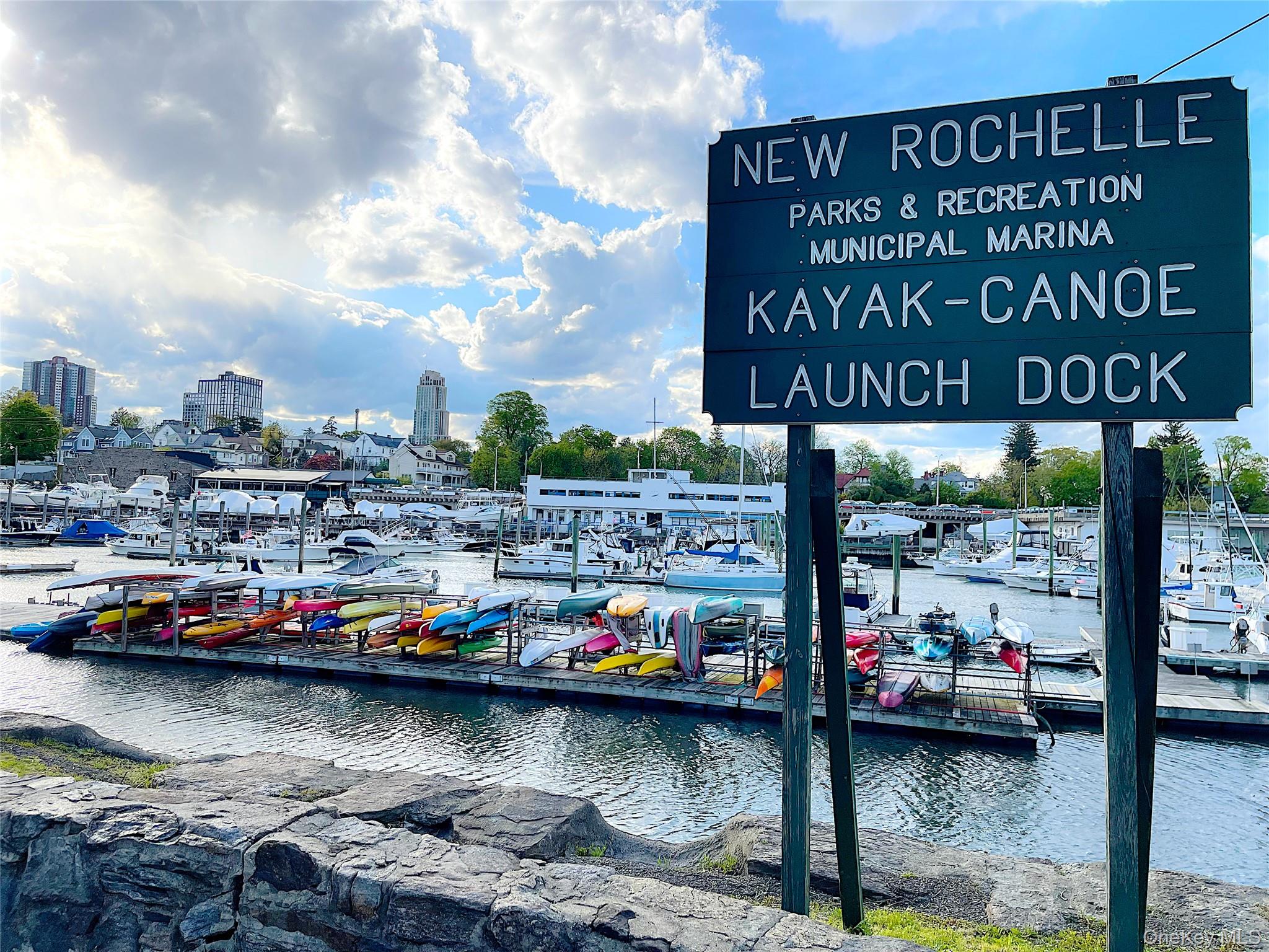 25 Acacia Terrace, Unit 2 New Rochelle, NY 10805 - Photo 25 of 28 a city view with boat and cars