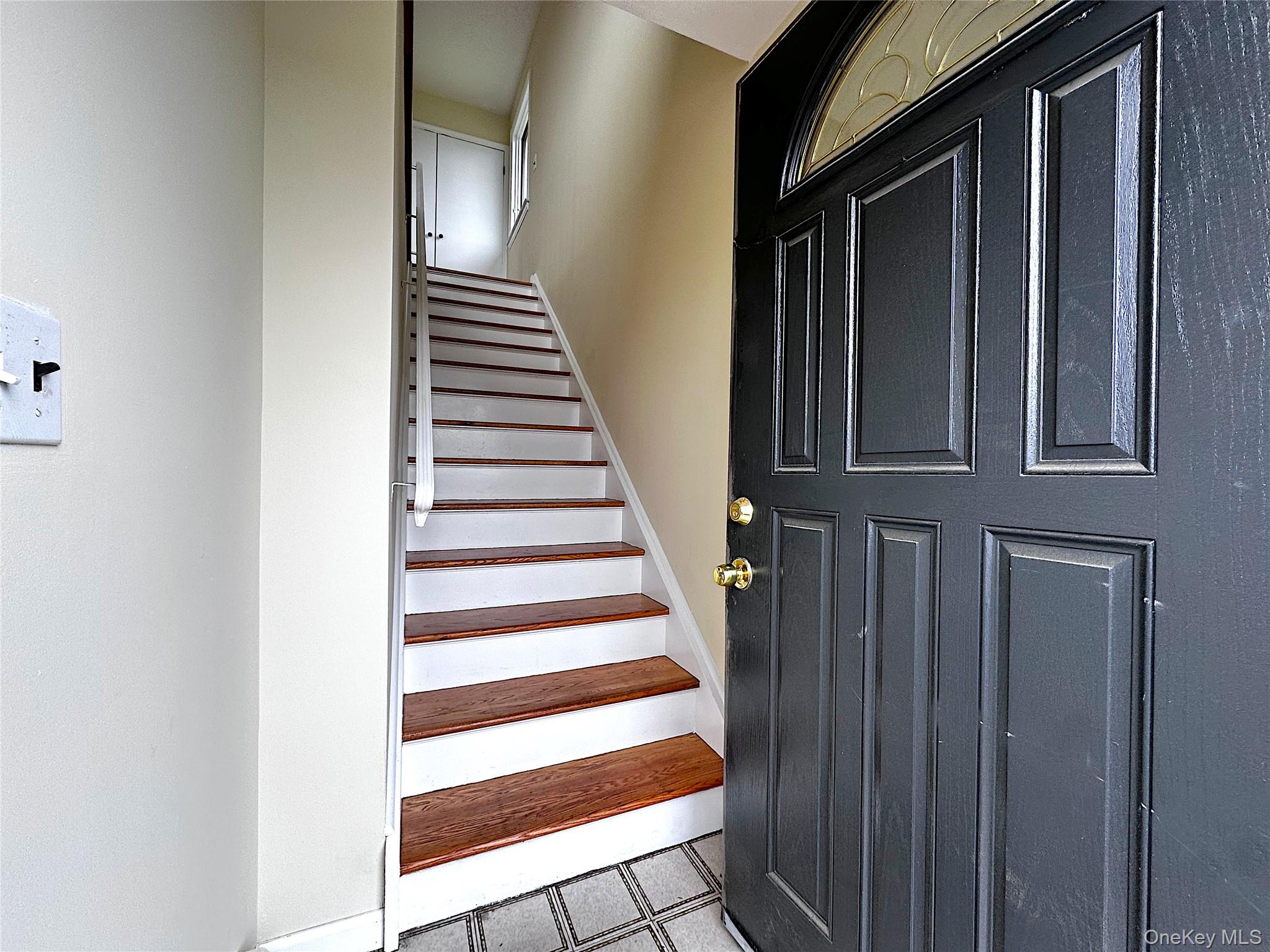 25 Acacia Terrace, Unit 2 New Rochelle, NY 10805 - Photo 3 of 28 a view of entryway with wooden floor and stairs
