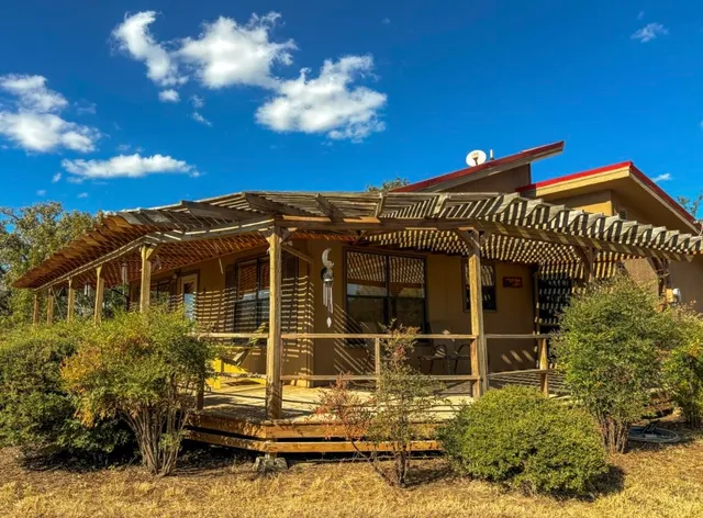 a view of a house with a small yard