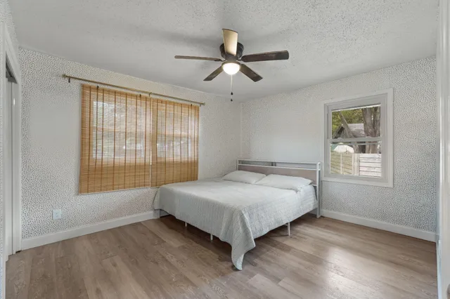 a kitchen with a refrigerator and cabinets