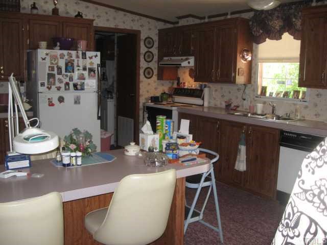 236 Club Pond Road Henderson, NC 27537 - Photo 3 of 12 kitchen