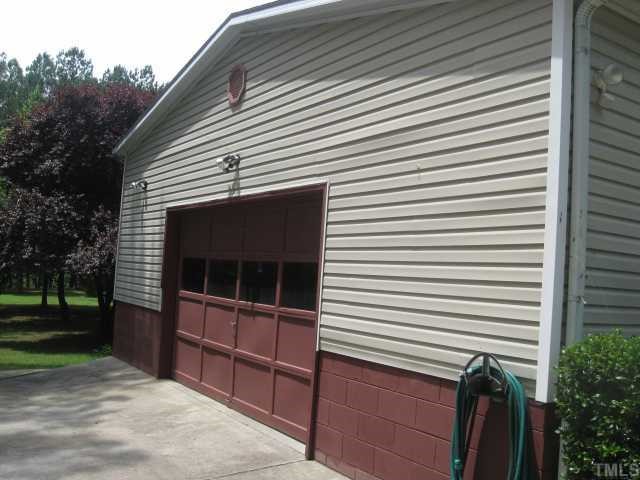 236 Club Pond Road Henderson, NC 27537 - Photo 8 of 12 Side entry garage