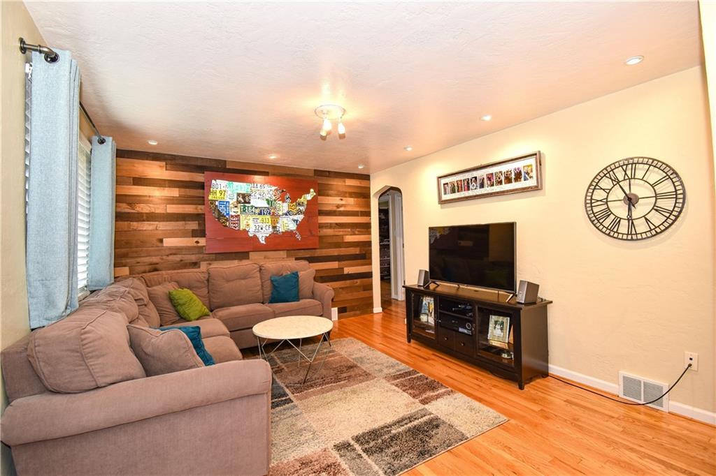 378 Streets Run Road Pittsburgh, PA 15236 - Photo 3 of 19 Beautiful living room with refinished hardwood floors!