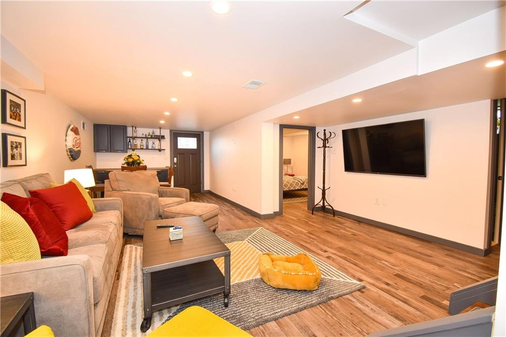 378 Streets Run Road Pittsburgh, PA 15236 - Photo 6 of 19 Massive gameroom with awesome laminate floors!
