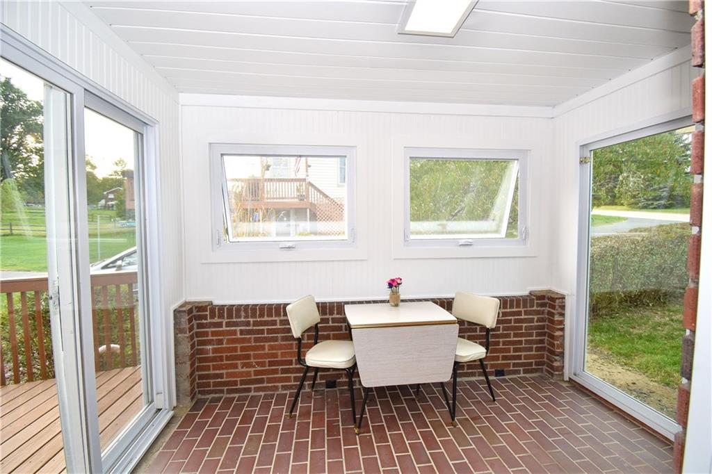378 Streets Run Road Pittsburgh, PA 15236 - Photo 9 of 19 Lovely sun room to enjoy your morning coffee or dinner!