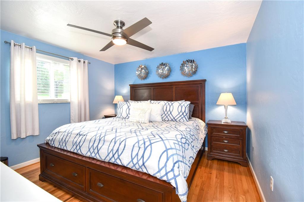 378 Streets Run Road Pittsburgh, PA 15236 - Photo 10 of 19 Master bedroom features ceiling fan and hardwood floors!