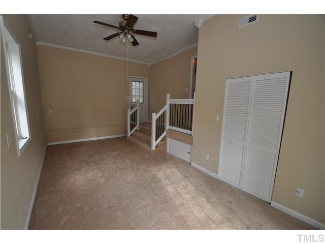 2421 Long And Winding Road Raleigh, NC 27603 - Photo 7 of 17 First floor bedroom could also make a great office, bonus, or rec room.