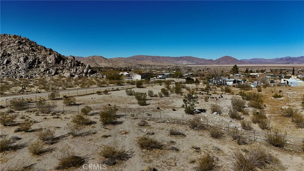 728 Red Butte Road Lucerne Valley, CA 92356 - Photo 3 of 10 a view of a city with mountains in the background