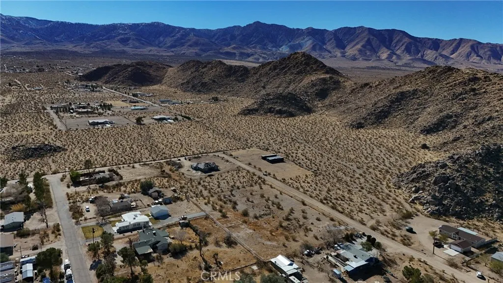 728 Red Butte Road Lucerne Valley, CA 92356 - Photo 5 of 10 a view of a house with a mountain