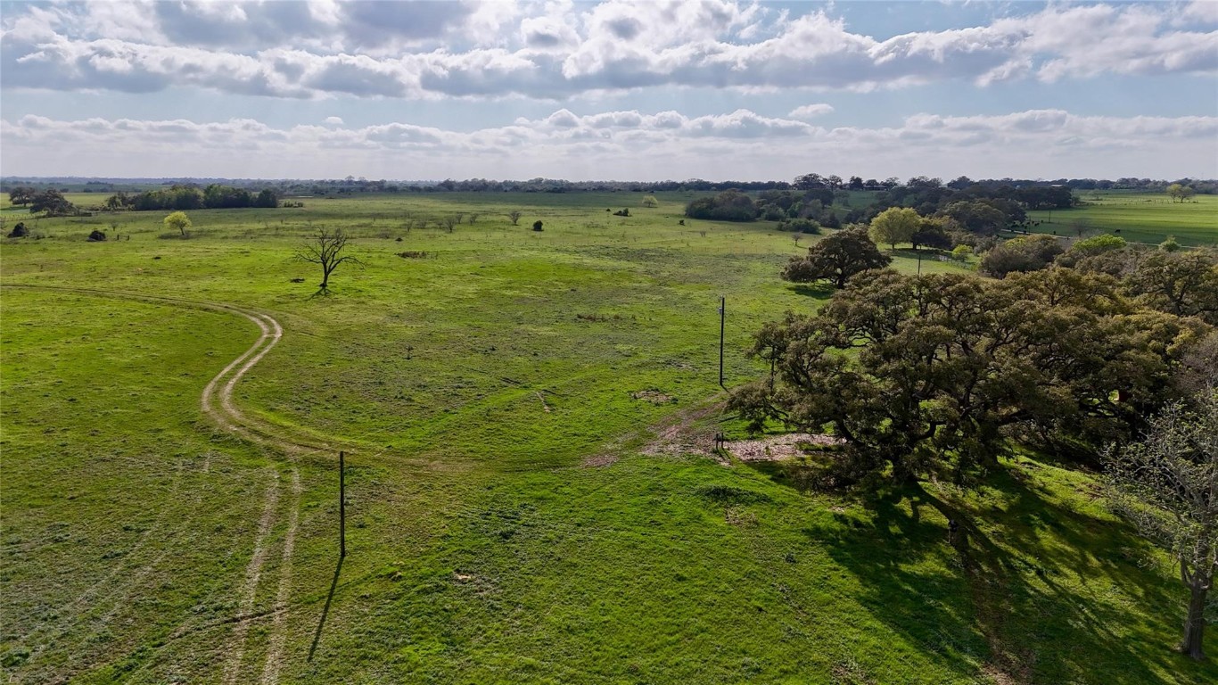 494 County Road 217 Schulenburg, TX 78956 - Photo 19 of 39 a view of a lake with a yard