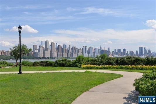 7400 River Road, Unit 116 North Bergen, NJ 07047 - Photo 28 of 32 a view of a city with tall buildings