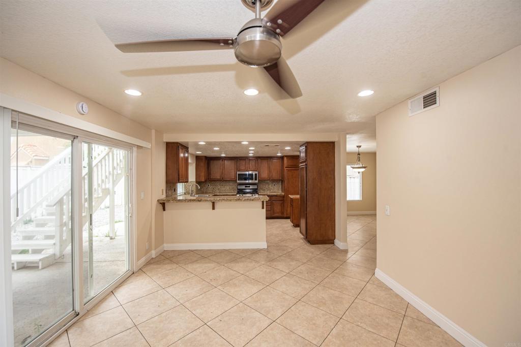 28679 Corte Capri Menifee, CA 92584 - Photo 30 of 66 a kitchen with stainless steel appliances granite countertop a refrigerator and a sink