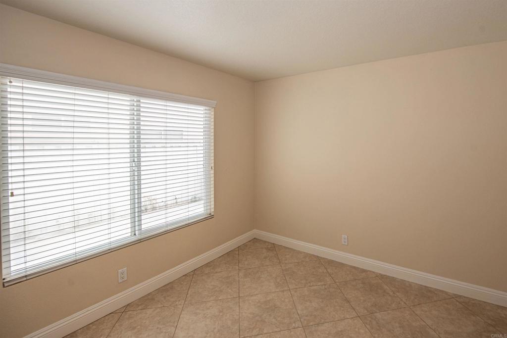 28679 Corte Capri Menifee, CA 92584 - Photo 35 of 66 an empty room with a window