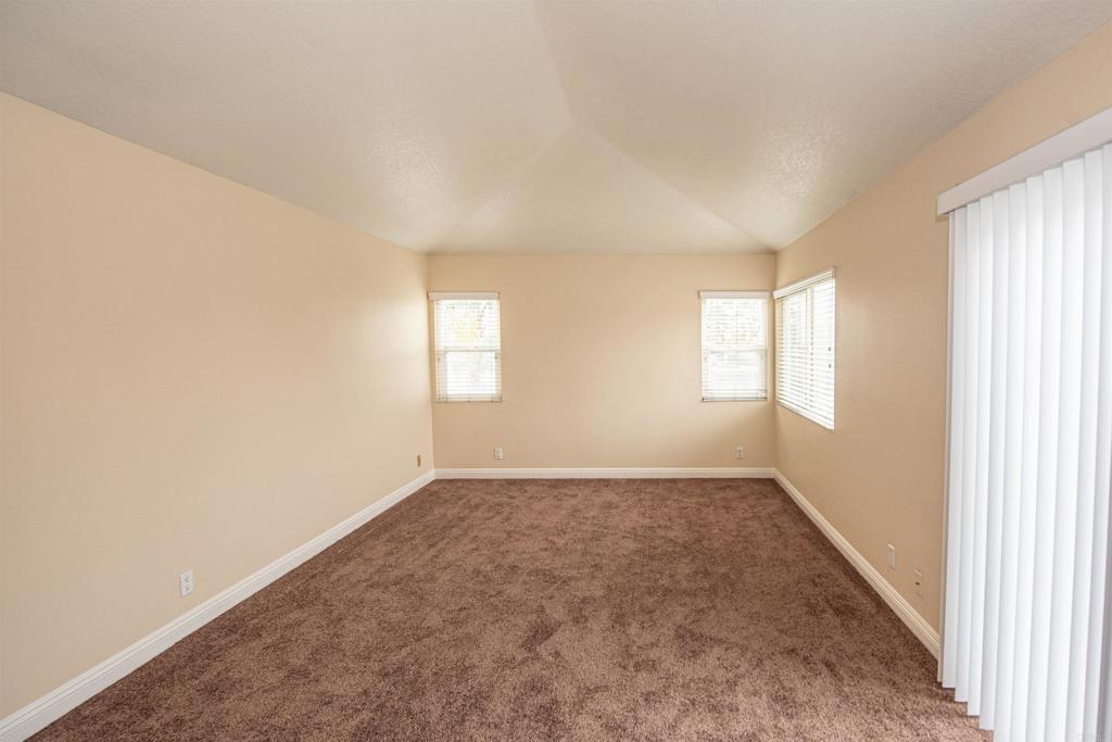 28679 Corte Capri Menifee, CA 92584 - Photo 46 of 66 an empty room with windows