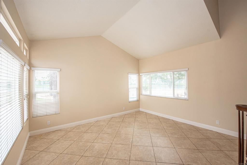 28679 Corte Capri Menifee, CA 92584 - Photo 9 of 66 an empty room with windows