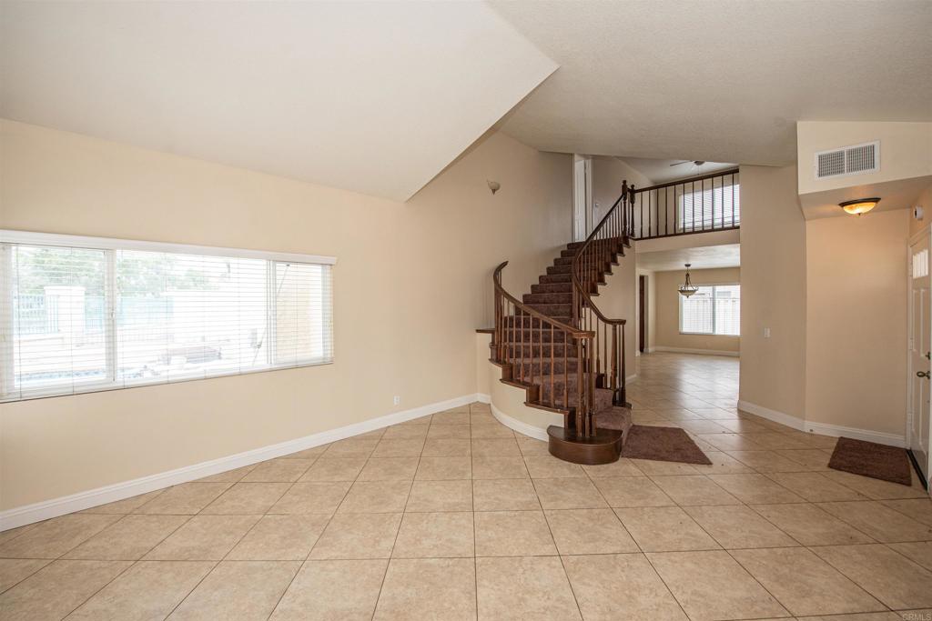 28679 Corte Capri Menifee, CA 92584 - Photo 10 of 66 a view of entryway and hall with a window