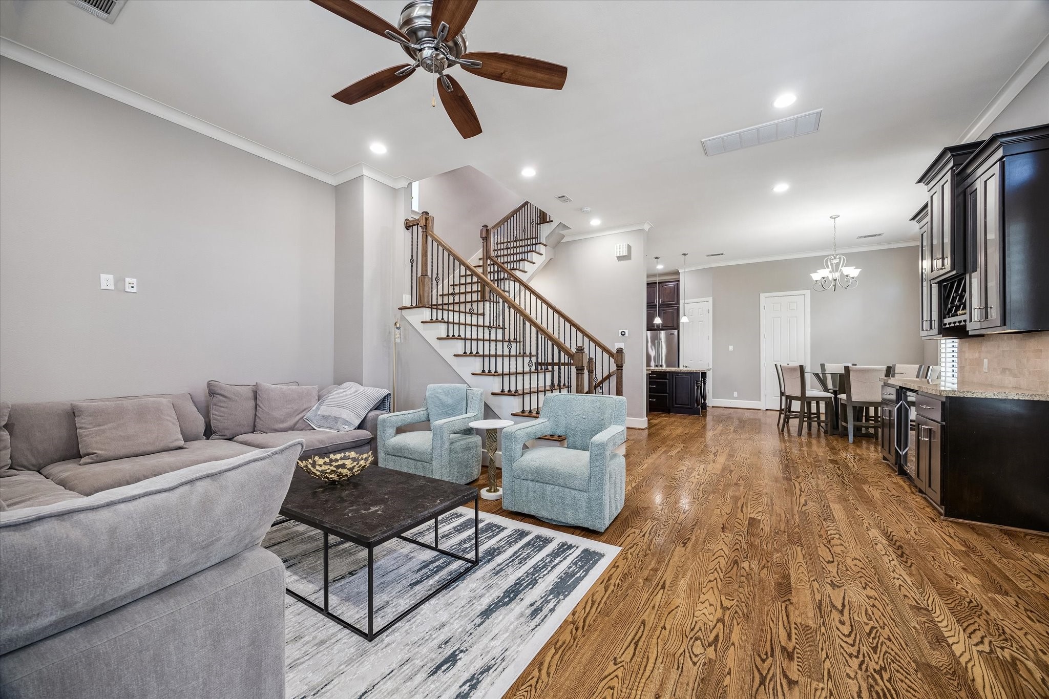 3123 Austin Street Houston, TX 77004 - Photo 13 of 24 a living room with furniture and a wooden floor