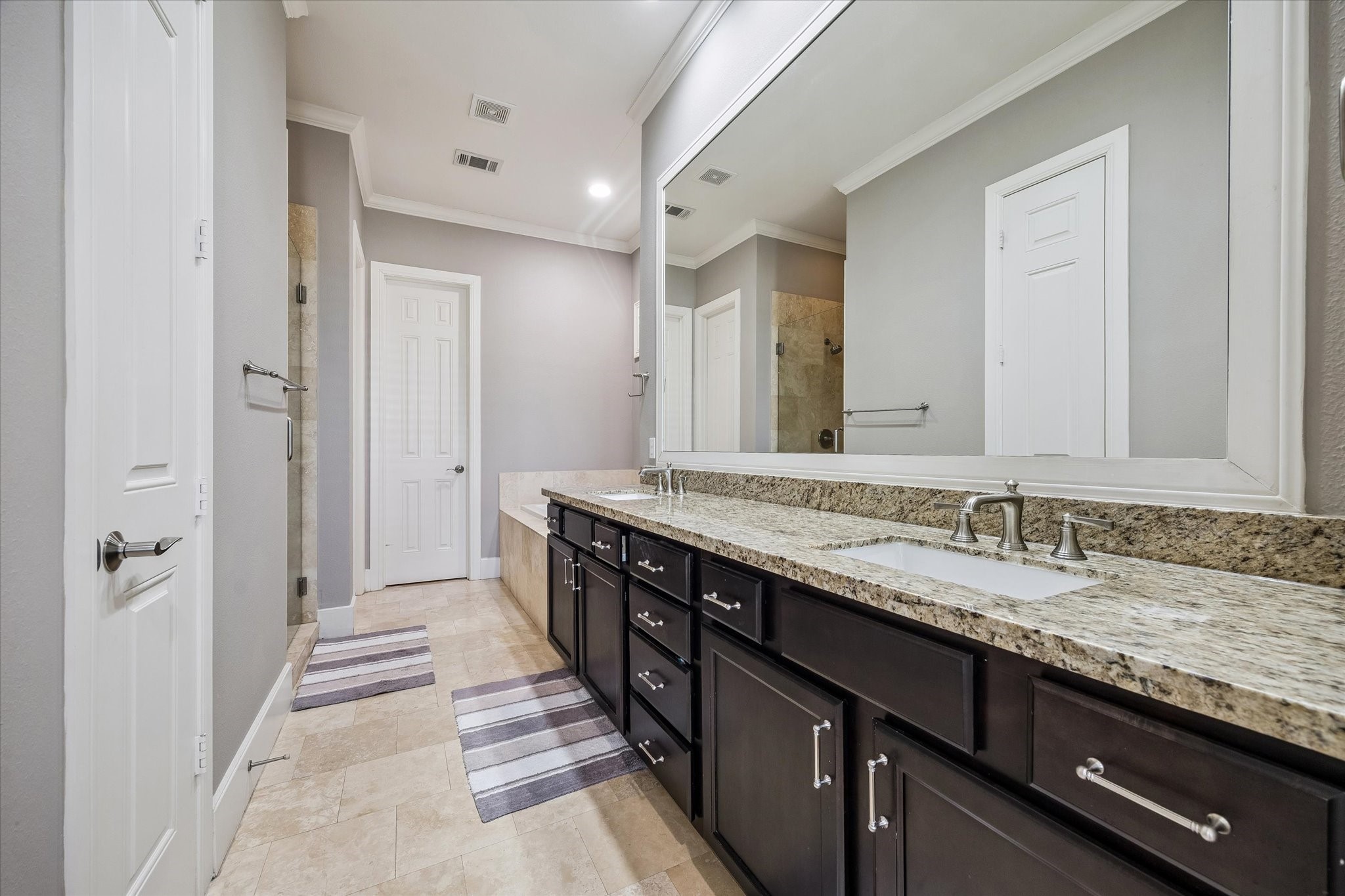 3123 Austin Street Houston, TX 77004 - Photo 18 of 24 a bathroom with a granite countertop sink and a mirror
