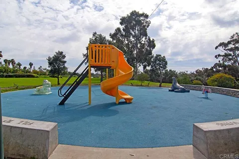 a view of a park with slide