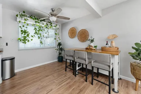 a workspace with furniture and a window