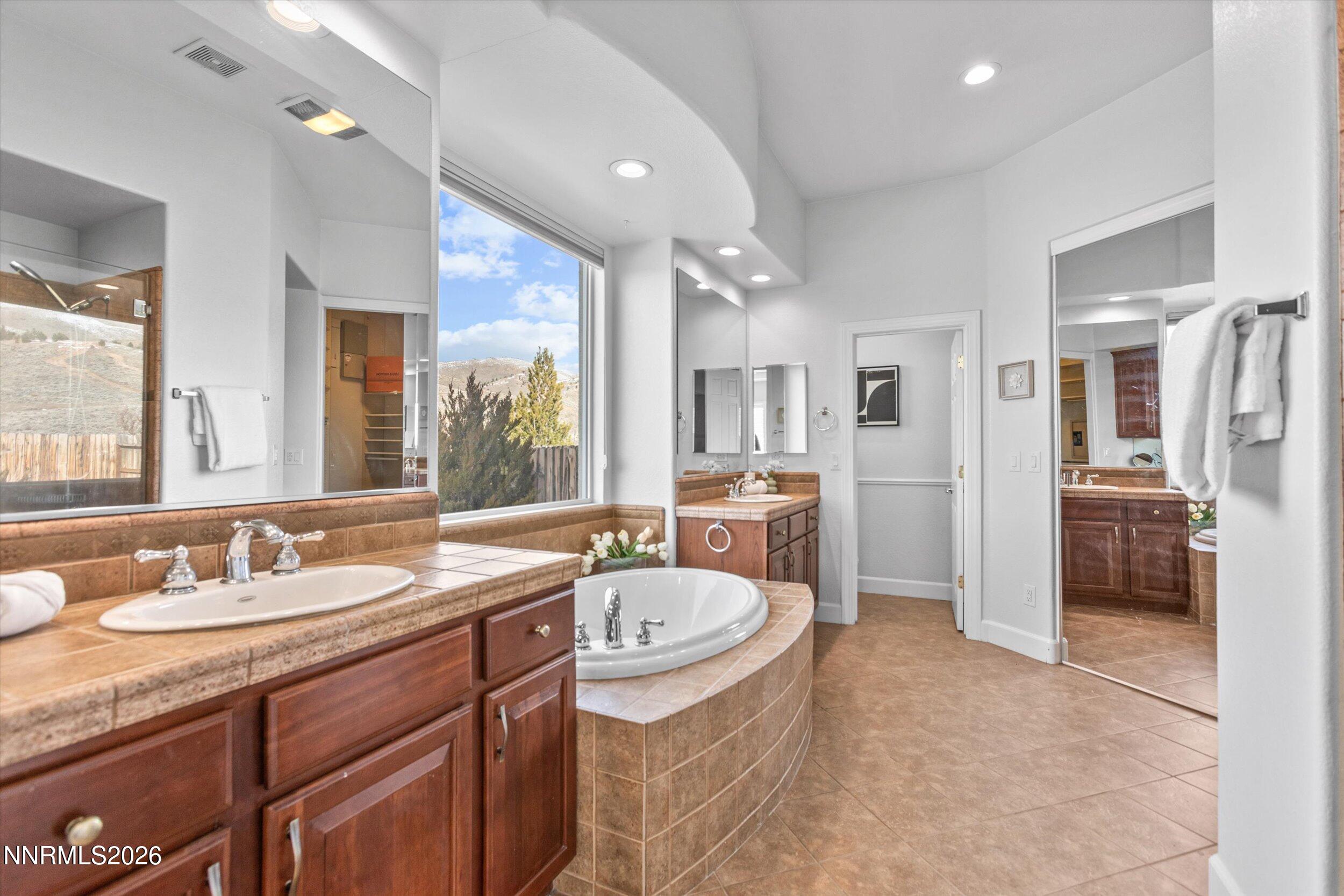 5850 Geode Court Reno, NV 89523 - Photo 29 of 88 a spacious bathroom with a sink double vanity