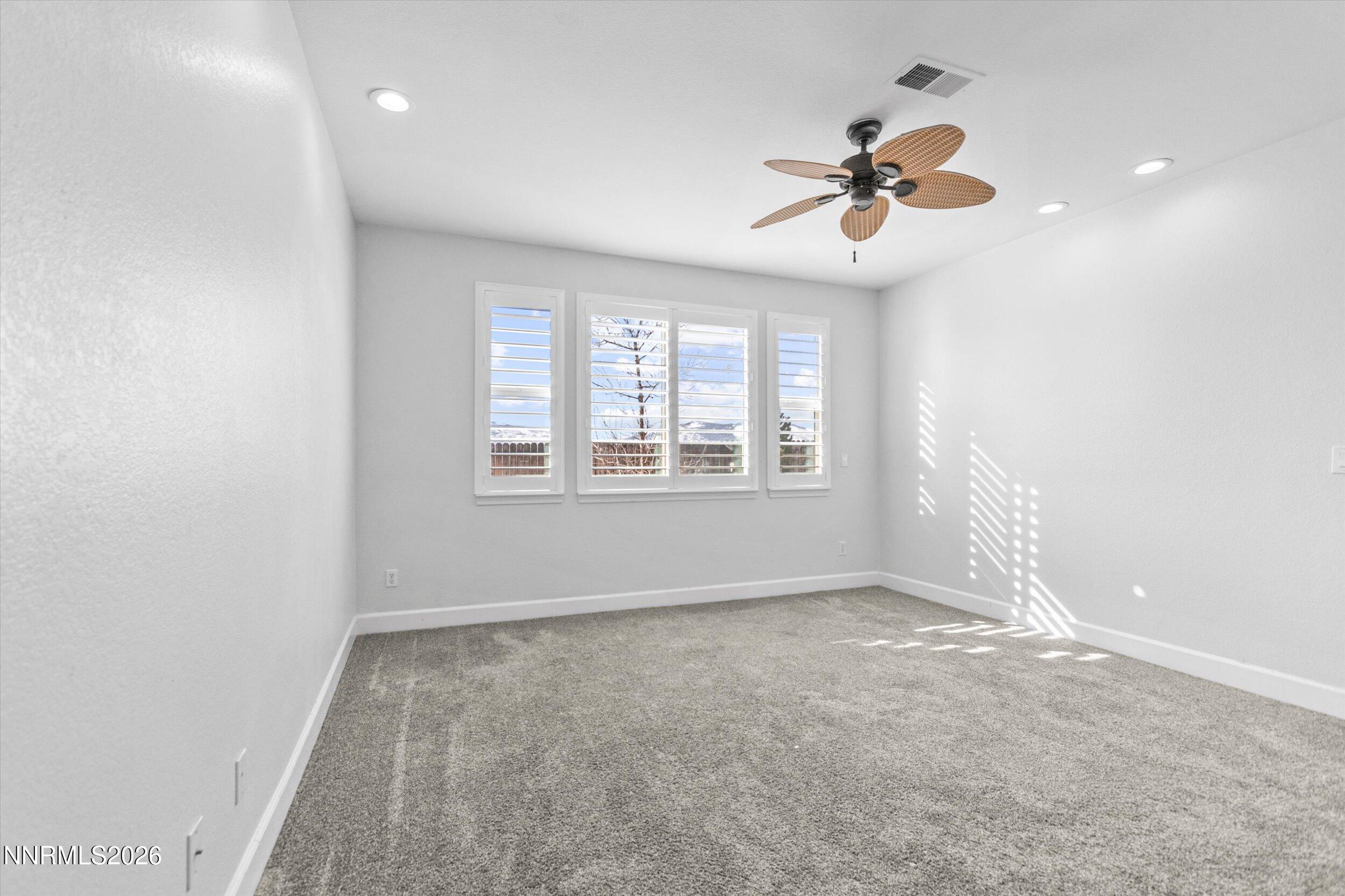 5850 Geode Court Reno, NV 89523 - Photo 34 of 88 an empty room with windows and fan