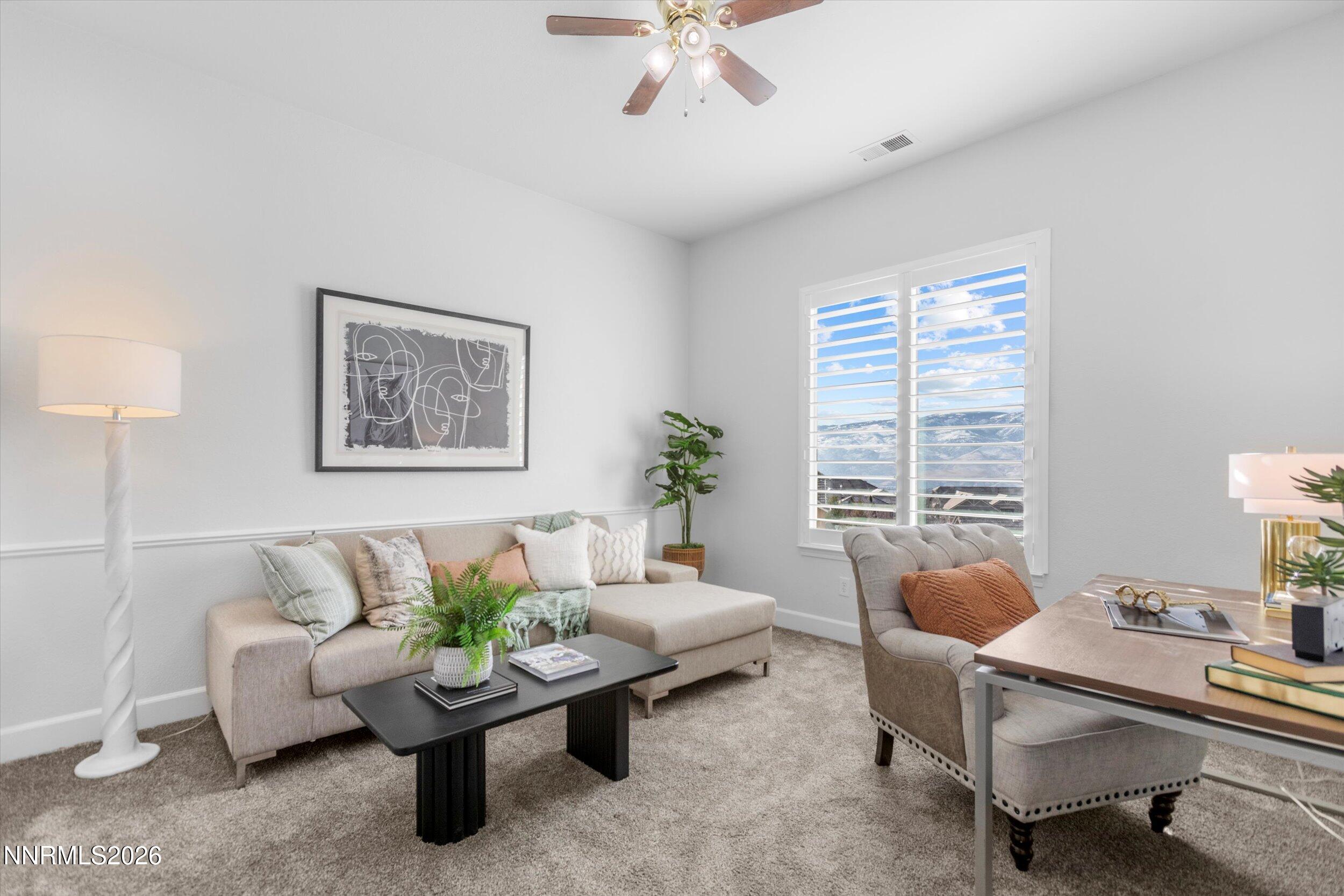 5850 Geode Court Reno, NV 89523 - Photo 37 of 88 a living room with furniture and a large window