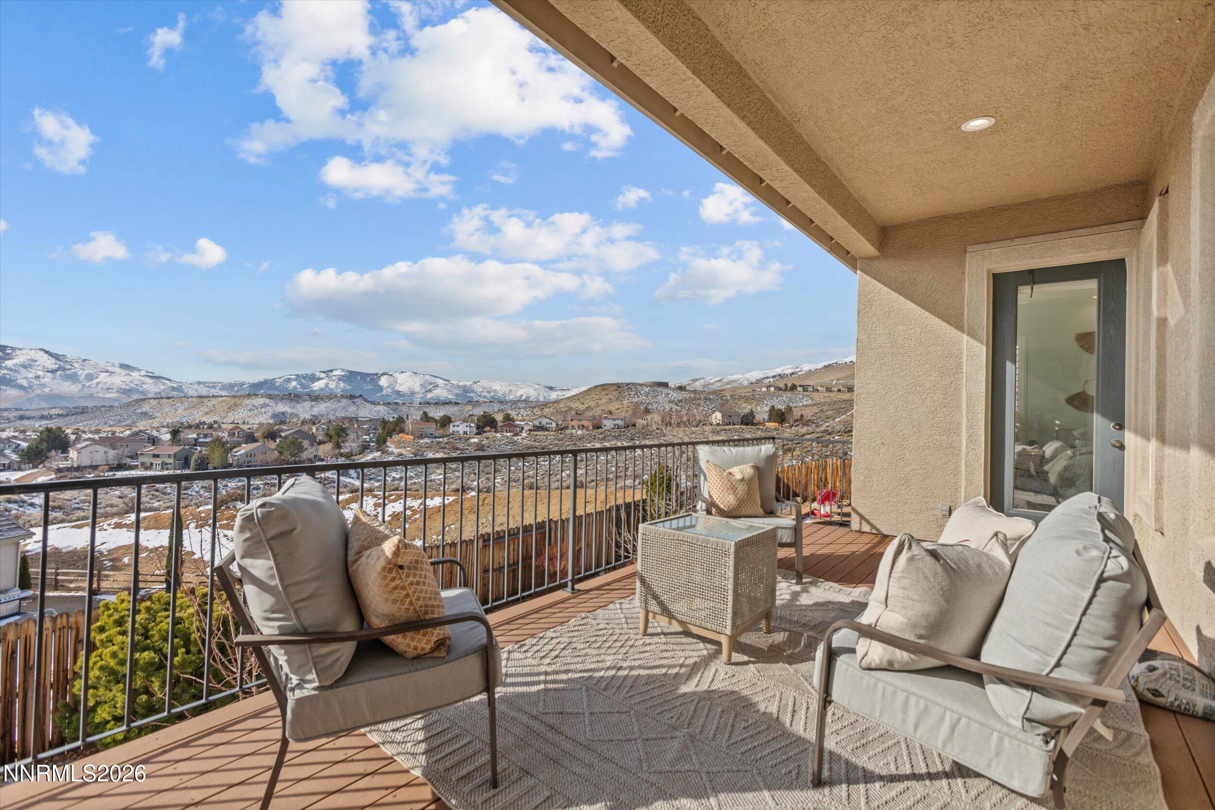5850 Geode Court Reno, NV 89523 - Photo 62 of 88 a view of a balcony with chair and table