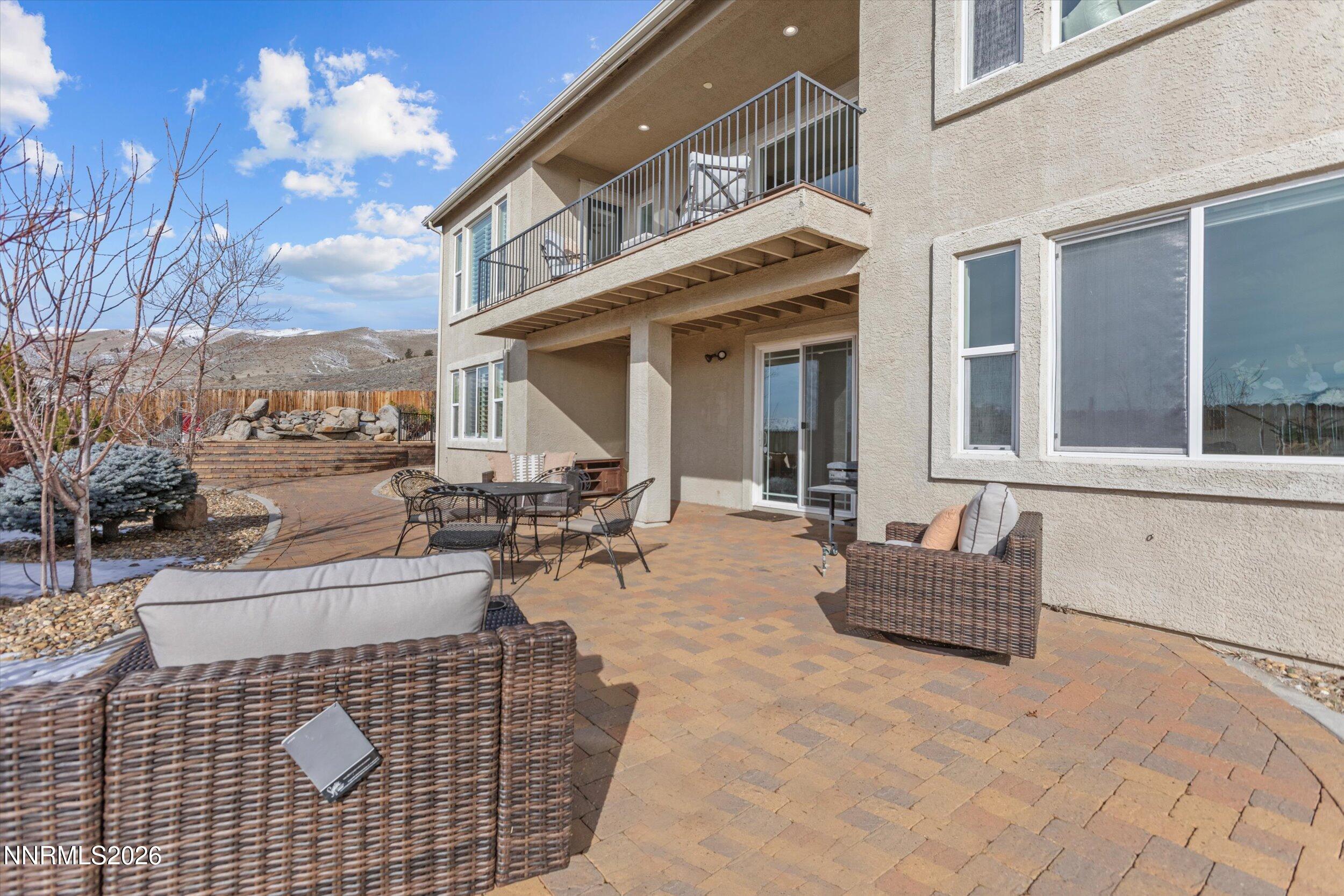 5850 Geode Court Reno, NV 89523 - Photo 68 of 88 a building outdoor space with patio furniture and potted plants