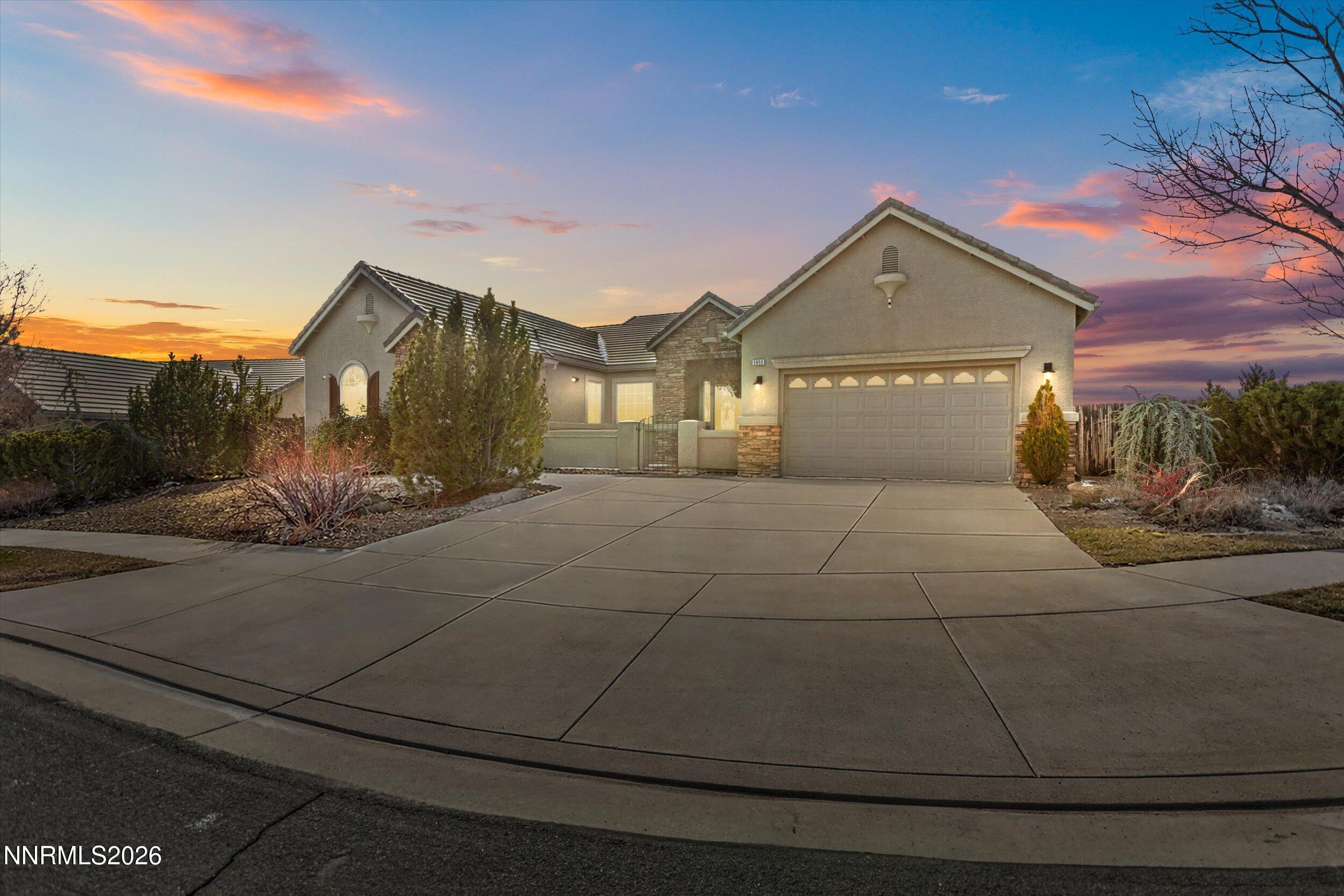 5850 Geode Court Reno, NV 89523 - Photo 72 of 88 a front view of a house with a yard