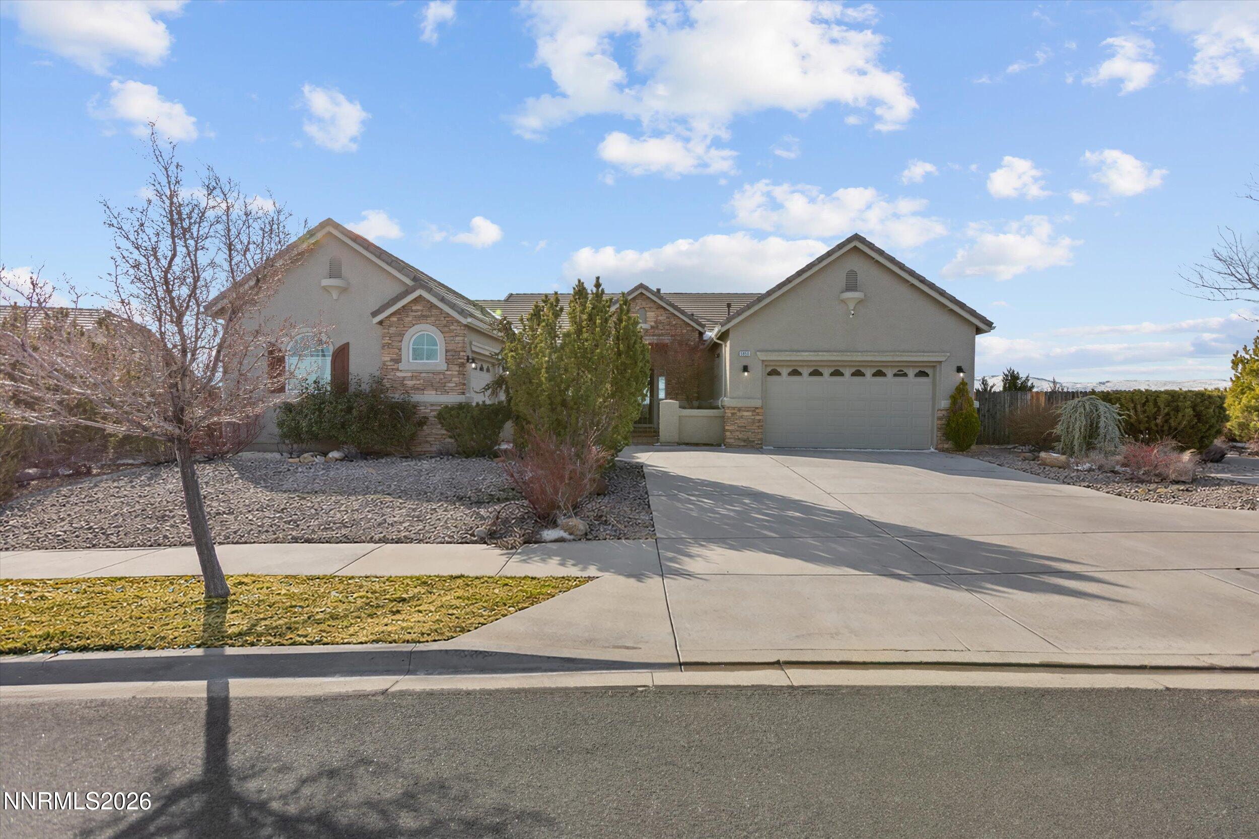 5850 Geode Court Reno, NV 89523 - Photo 74 of 88 a view of a house with a swimming pool with a yard