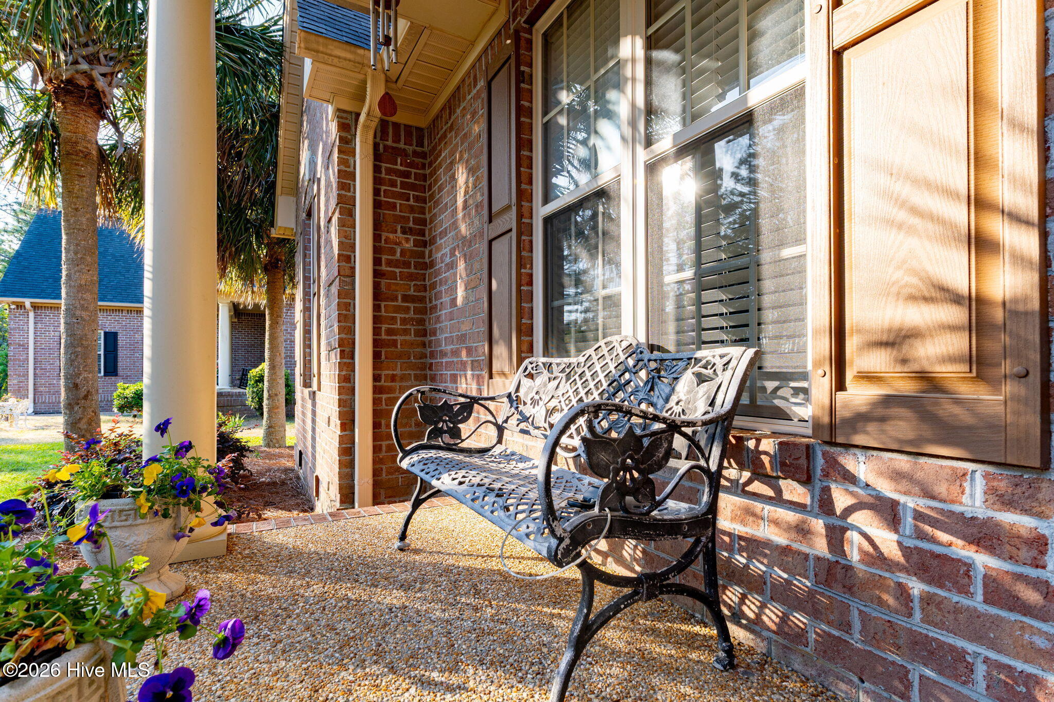 137 Ash Road Southport, NC 28461 - Photo 3 of 64 Open front porch ready for morning coffee.