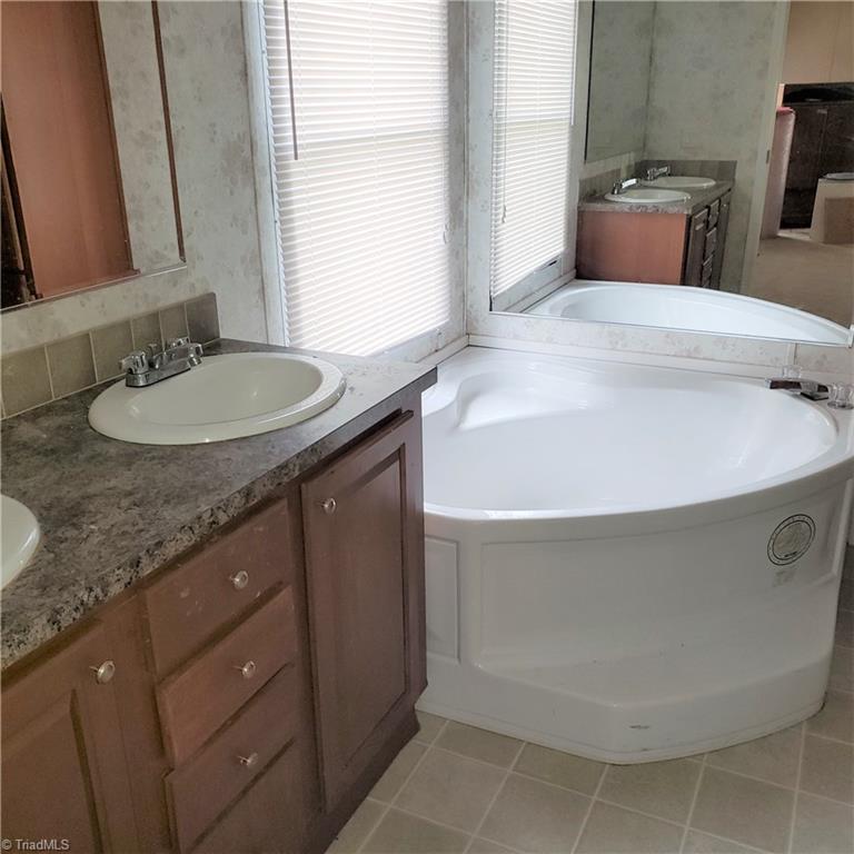 690 Cook Road Rural Hall, NC 27045 - Photo 18 of 30 Well finished spa bathroom!!