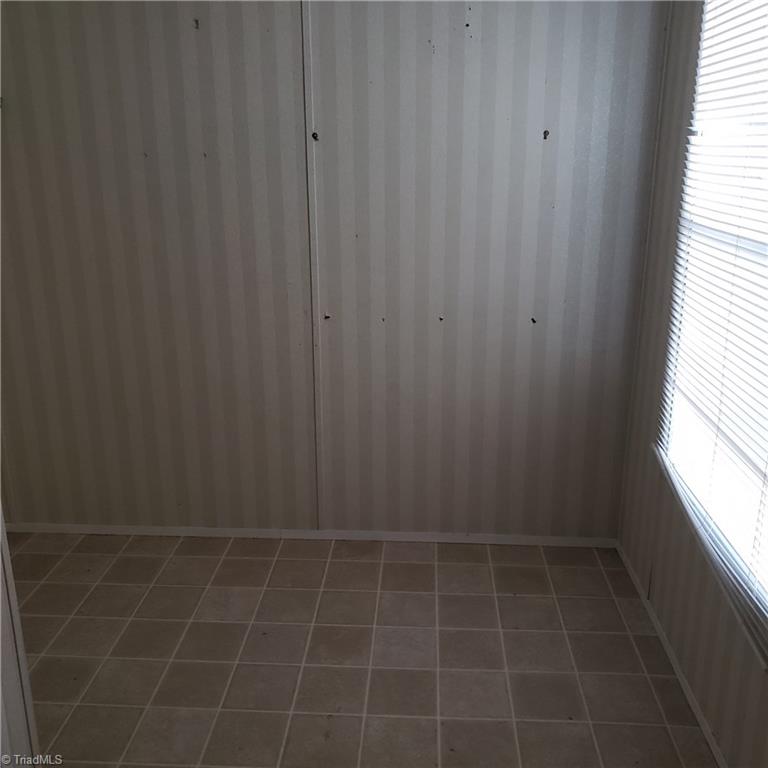 690 Cook Road Rural Hall, NC 27045 - Photo 30 of 30 Extra space in laundry room for storage/freezer/bicycles/etc.
