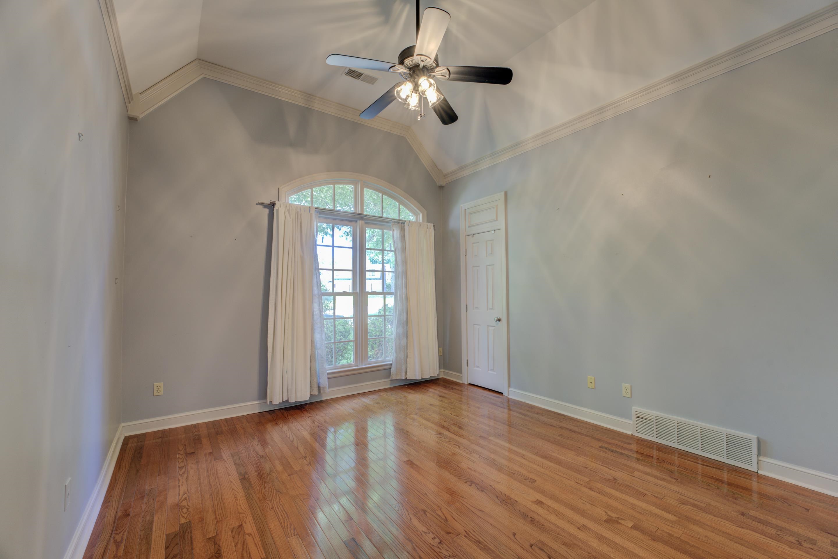 2142 Gallina Circle Collierville, TN 38017 - Photo 18 of 35 wooden floor in an empty room with a window