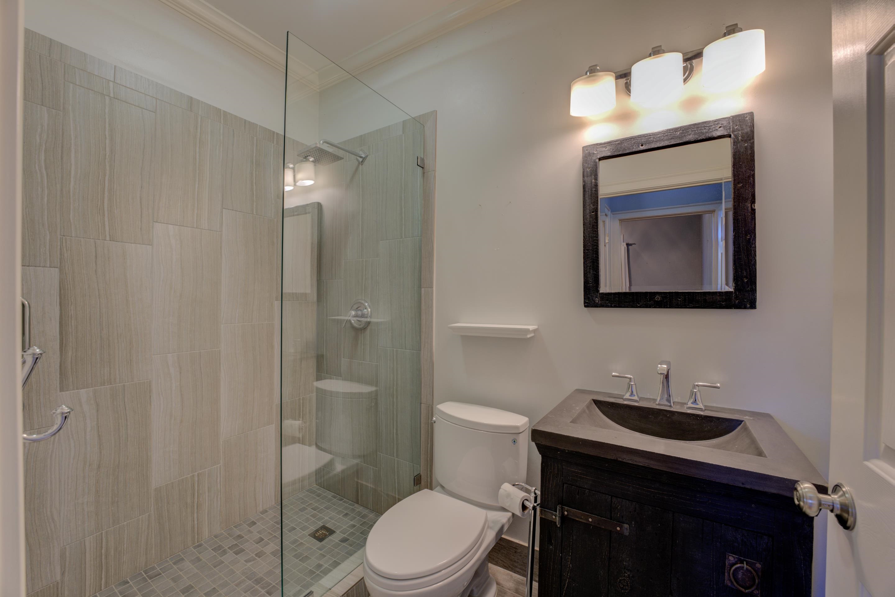 2142 Gallina Circle Collierville, TN 38017 - Photo 19 of 35 a bathroom with a toilet a sink a mirror and vanity
