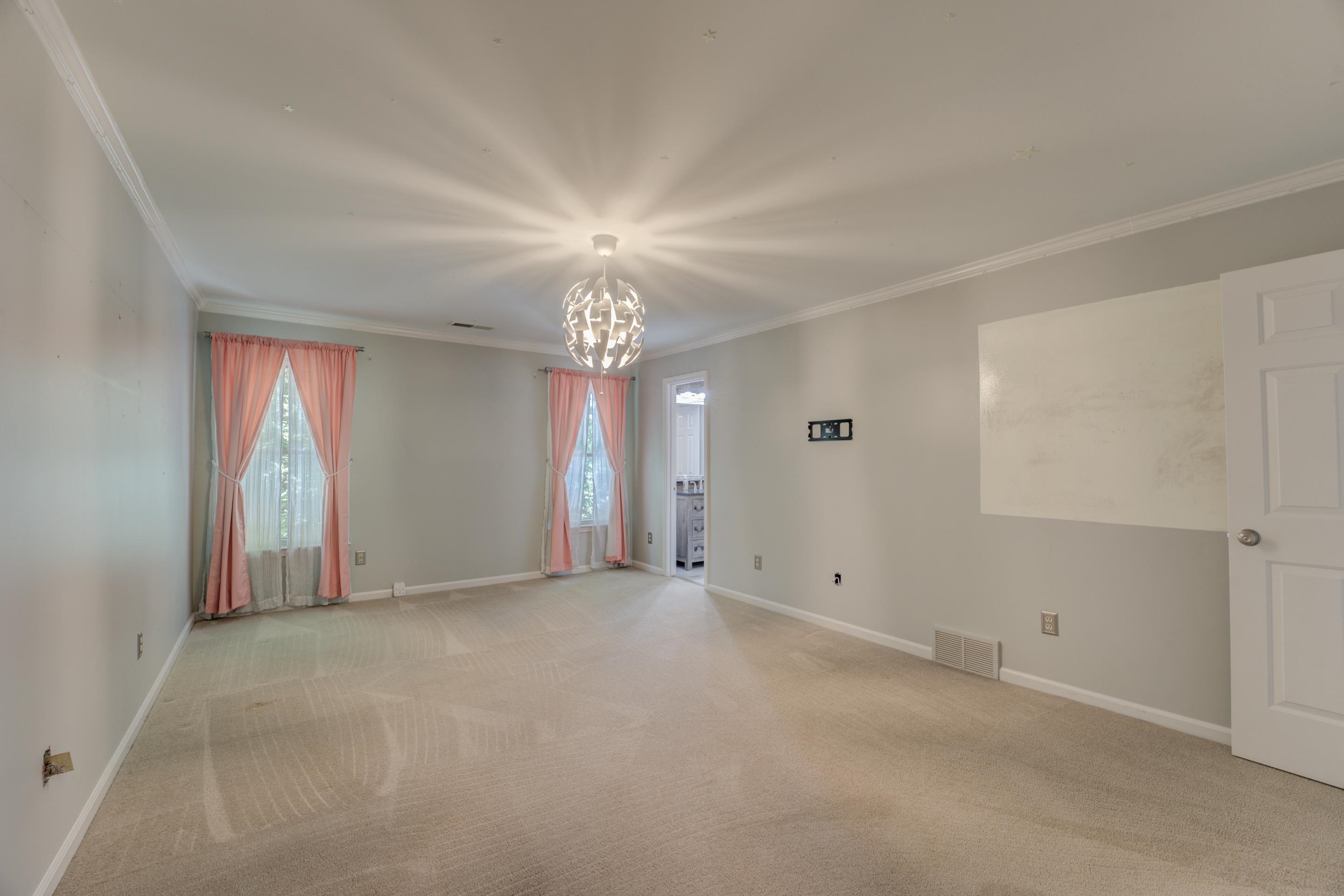 2142 Gallina Circle Collierville, TN 38017 - Photo 27 of 35 an empty room with chandelier fan