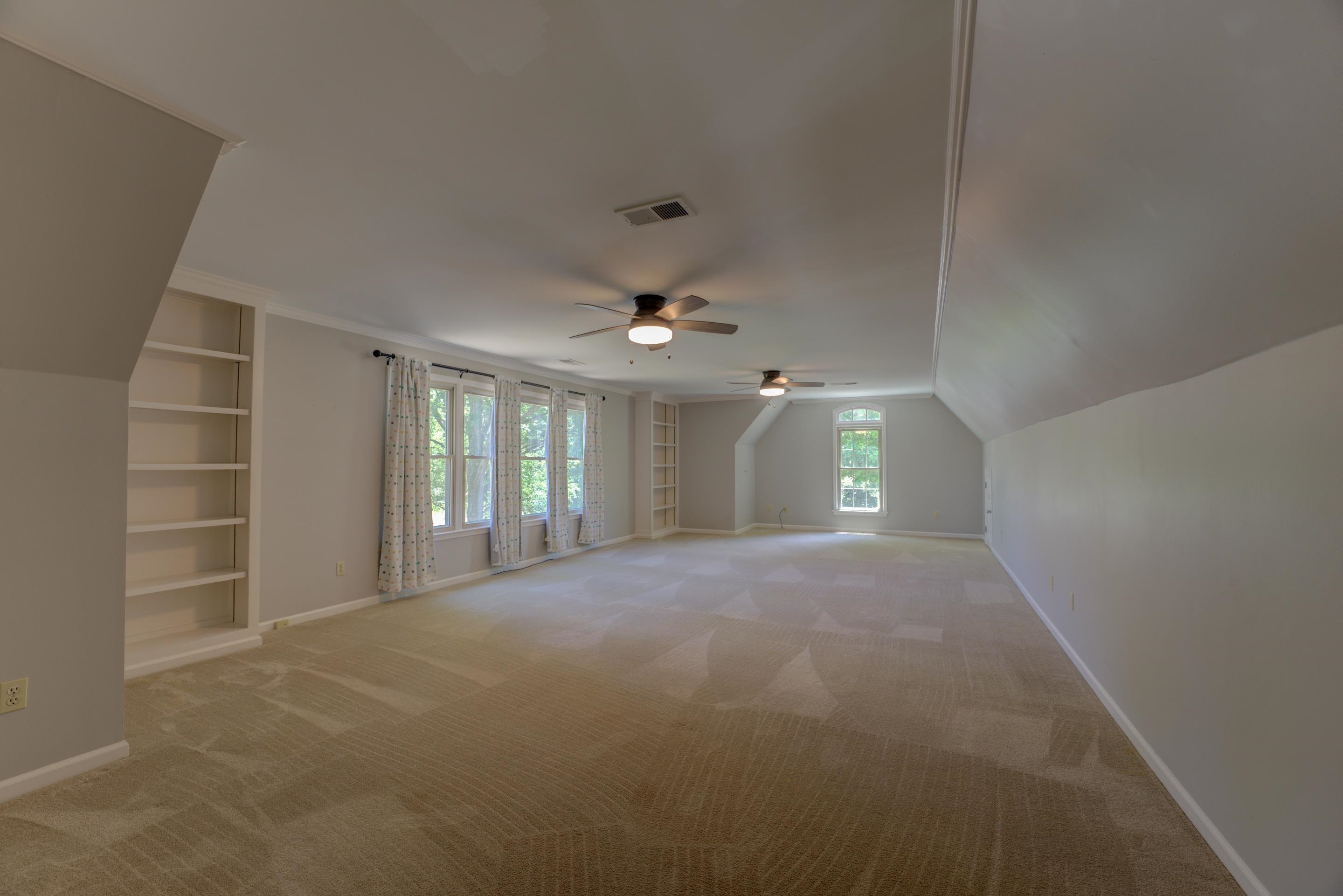 2142 Gallina Circle Collierville, TN 38017 - Photo 29 of 35 a view of empty room with windows and ceiling fan
