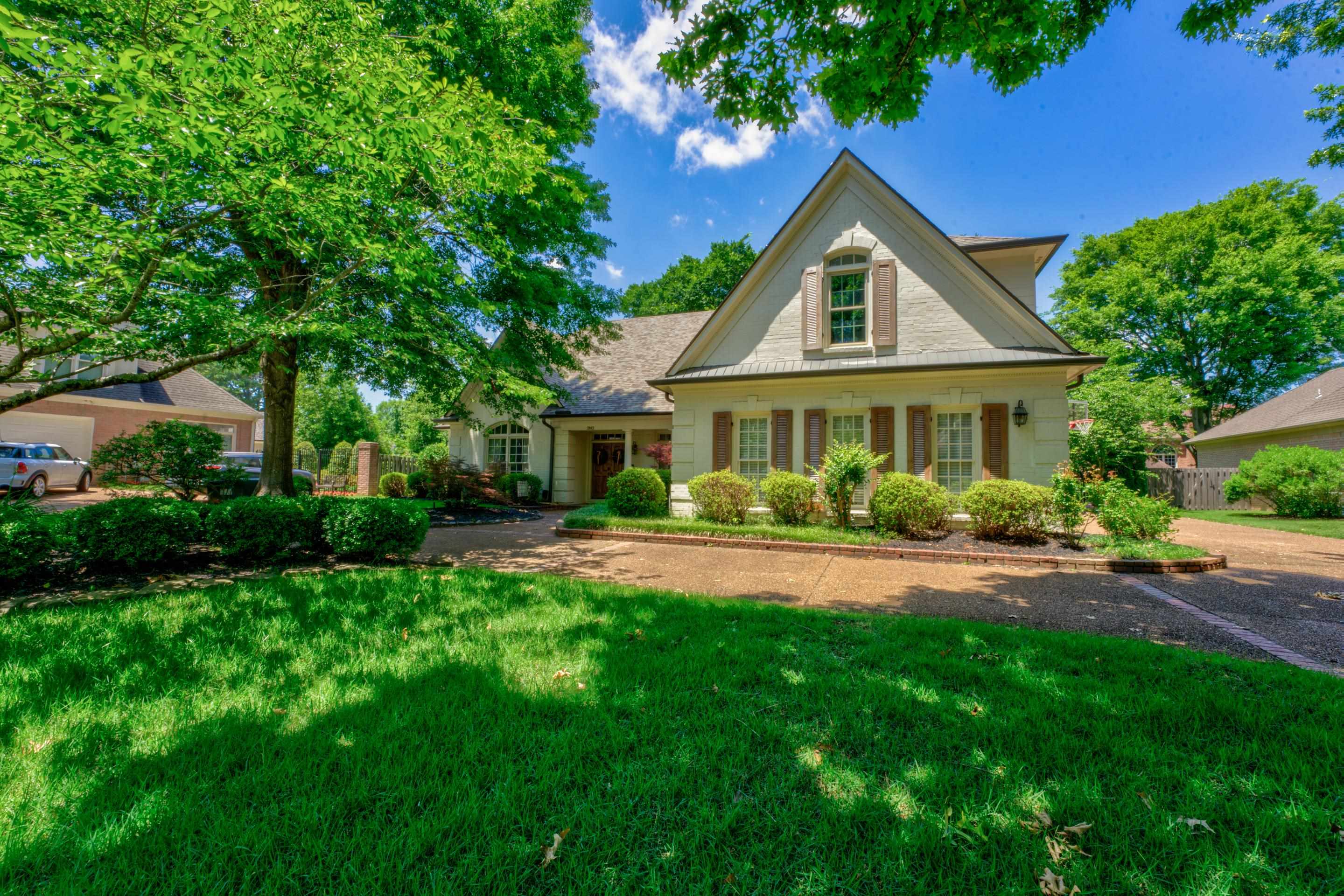 2142 Gallina Circle Collierville, TN 38017 - Photo 3 of 35 a front view of a house with a yard and porch