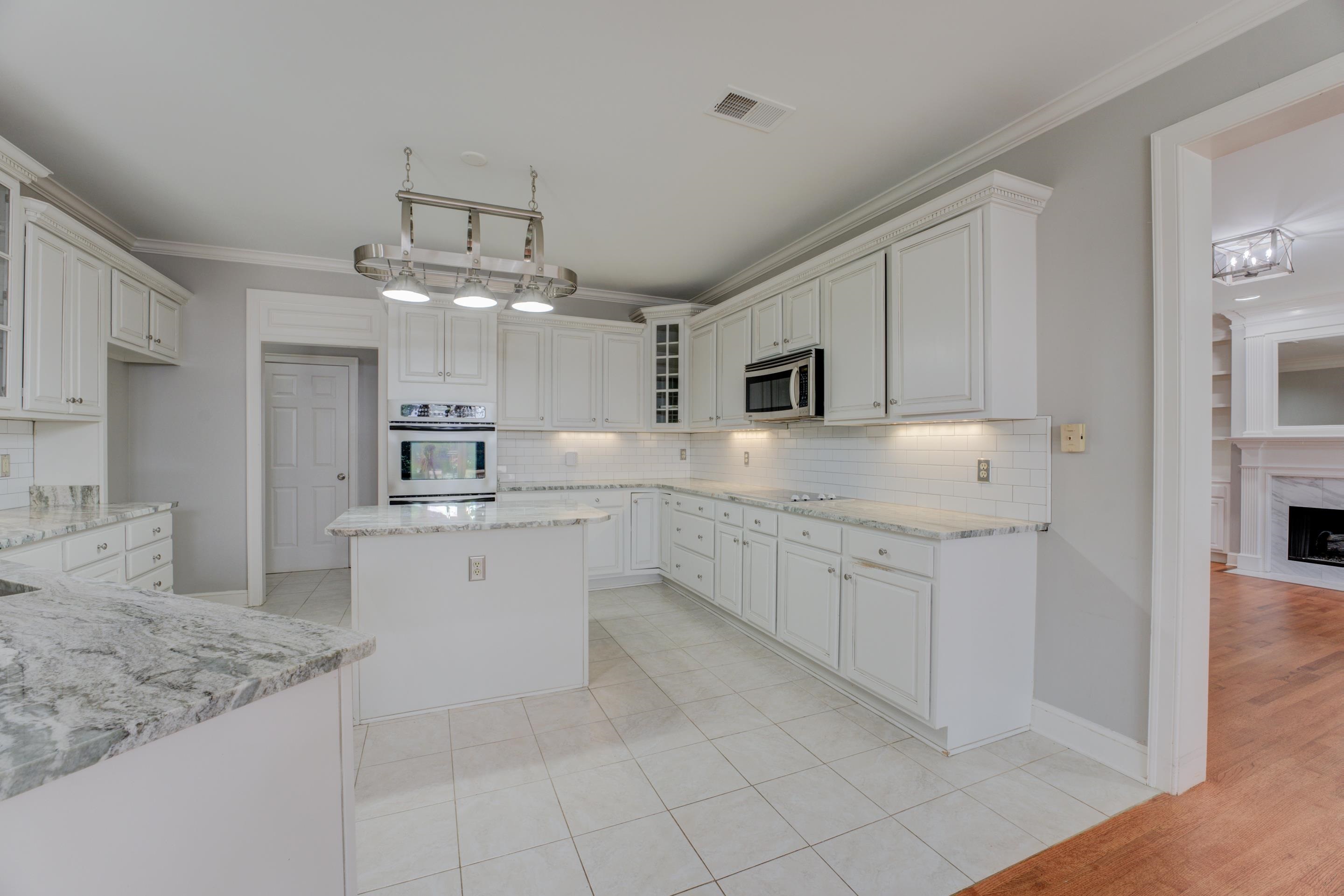 2142 Gallina Circle Collierville, TN 38017 - Photo 10 of 35 a kitchen with granite countertop cabinets and stainless steel appliances