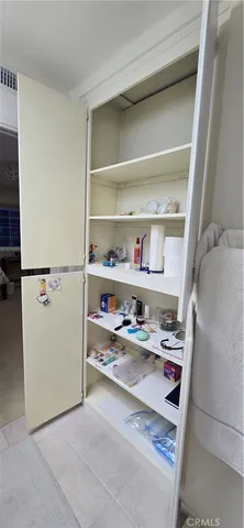 a storage room with washer and dryer