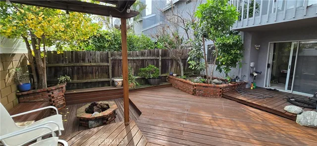 a view of a patio with two chairs and a table