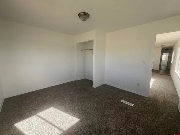 an empty room with a door